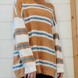 striped blue, brown, and white sweater